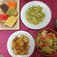 Mixed bruschetta €6.00, Pasta with Umbrian pesto €11.00, Roast potatoes €5.00, Panzanella €5.00 at Degli Orti in Assisi