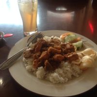 Spicy tofu & tempeh in tomato sauce, with rice at I Love Vegetarian Food - De Ra Sa in Tuban