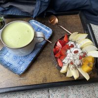 Superpower bowl with a matcha latte  at Acai Poke in Prague