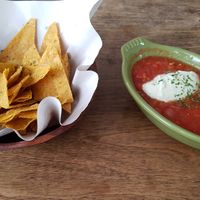 Tortilla chips with chili sauce and cheese at Bonita Cafe and Social Club in Bangkok