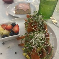 Arugula Blossom Bagel & Carrot Lox, Fresh Fruit, Pop Tart Pastry, and Green Juice  at Flora Jeans in Little Rock