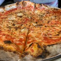Mariana pizza and beer special with vegan cheez substitute  at Bella Luna in Harrisonburg