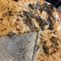 Make your own pizza, but vegan: with vegan cheez, mushrooms and garlic purée  at Bella Luna in Harrisonburg