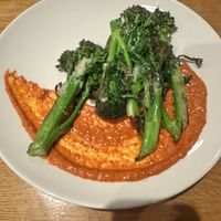 Seasonal Item - Broccolini  w/ vegan cheese + mojo sauce. This was also very amazing with tons of flavor.   at Bella Luna in Harrisonburg