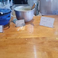 Sauces and toppings for self-service, clearly marked as vegan at Go Healthy in Koh Phangan