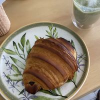 Vegan chocolate croissant, matcha latte  at Casa Hoja in Pereira