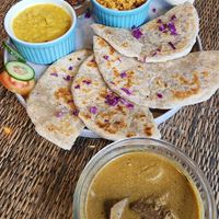 Coconut roti platter, comes with dahl curry, seeni sambol (sweet caramelised onion), coconut sambol at The White Rabbit  in Ella