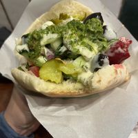 With sauces on top. The green one is great!  at Maoz - Muntplein in Amsterdam