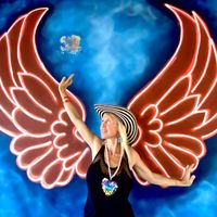 Look for the wings on the left, and enter! The bar on your right is a separate establishment (this bill) but where you will get your drinks from.   at Vegan Barrio in Cozumel