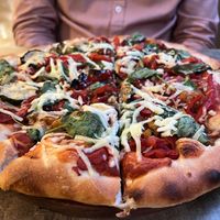 Vegetarian pizza with vegan cheese  at Drift & Wood Restaurant in Agnes Water