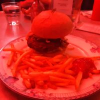 They have a red light in the dining area so this picture isn't very good. This is the veggie burger,  I would recommend! at Electric Diner in Hamilton