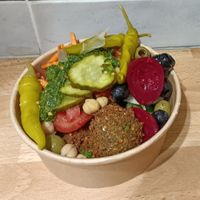 Falafel salad bowl with spicy pesto sauce at Maoz - Leidsestraat in Amsterdam
