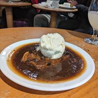 Sticky toffee pudding with vegan ice cream at 10 to 10 in Delhi in Edinburgh