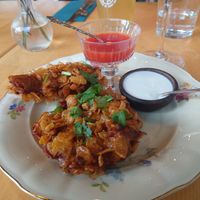 ROYAL PAKORA - Fried oyster wedges with paprika and tomato chutney and lime yoghurt. at Manto in Malmo
