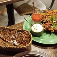 ROYAL PAKORA 
Crispy deep-fried and cornflake-breaded oyster shivling, served with spicy tomato chutney and sweet lime yoghurt at Manto in Malmo