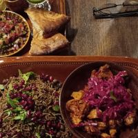 NAKHUD PALAW Pilaf rice with chickpeas, masala spiced soy chickn', red cabbage slaw, Afghan salad, tamarind and pomegranate sauce, garlic yogurt, coriander, walnut chutney & bread at Manto in Malmo