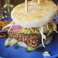 Crispy rice burger with fried tofu and various tasty veggies  at Manto in Malmo