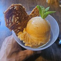 Sichuan ice cream from Köld with almond biscuit  at Manto in Malmo