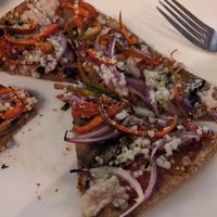 Pizza with vegan cheese at La Fortuna Pub in La Fortuna