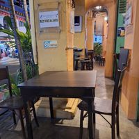 Outdoor seating area at Geographer Cafe in Malacca