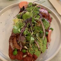 Avocado and hummus on toast  at Ringo Banana  in Sevilla