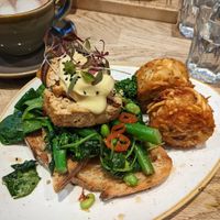Tofu Benedict with a side of hash browns at Moksha in Brighton