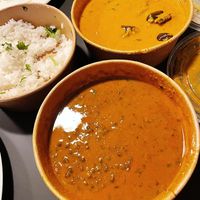 Black Dahl and Aubergine curry with white basmati rice  at Holy Cow in North West London