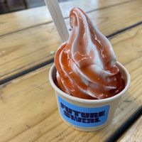 Oat milk vegan soft serve with strawberry coulis   at Future Swirl in Braddon