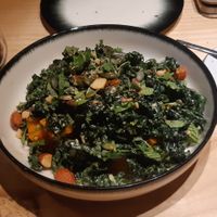 kale salad, roasted pumpkin, almonds, lemon dressing at and/or  in Antwerpen