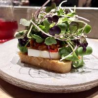 Vegan feta, polenta, spicy saucee  at and/or  in Antwerpen