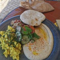 Balagan brekkie with scrambled Tofu and 2 Pita's. at Balagan Ericeira in Ericeira