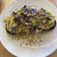 Green toast  at Numa Café - AMUN Cafe in Lisbon