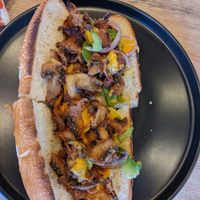 Fried Mushroom Philly Cheesesteak
Vegan. Breaded oyster mushrooms, peppers, onions and famous vromage vegan mozz. at Esco's Pizza in Los Angeles