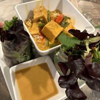 Fresh spring rolls and Penang curry with tofu and a Singha beer while waiting.  at Thai Bistro in Santa Barbara
