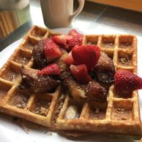 Vegan waffle, strawberries, baked bananas, raw walnuts, earth balance butter at Waffle Frolic in Ithaca