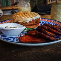 Medalovers Burger w/ sweet potato fries  at Alubia plant power in Mallorca
