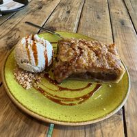 Apple pie/crumble with coconut ice cream.   at Alubia plant power in Mallorca