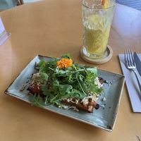 Mushroom, “cheese” and rocket waffle, with freshly pressed orange juice    at Alubia plant power in Mallorca