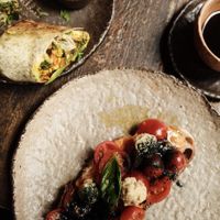 Breakfast burrito on the upper left  at Honest Greens - Fuencarral in Madrid