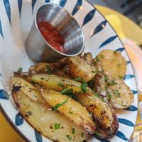 potatoes seasoned with herbes de Provence and BBQ sauce at Maison Binder in Paris