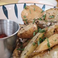 potatoes seasoned with herbes de Provence and BBQ sauce at Maison Binder in Paris