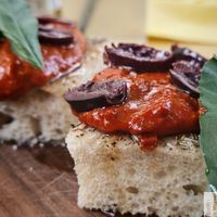 focaccia with smoked tomato cream and Kalamata olives at Maison Binder in Paris