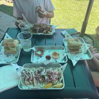 What’s left of the onion rings, fish tacos, shred fries, and an aloha burgerr  at Earth Aloha Eats in Kihei