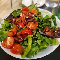 Mixed green salad included arugula, watercress and tomatoes at Fabbrica del Grano - Grani Antichi in Milan