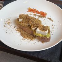 Smashed avocado with silk tofu and pistachio dukkah  at Jaya House River Park in Siem Reap