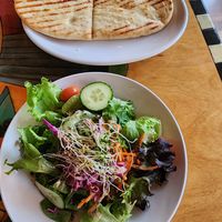 Salad with wonderful dressing and vegan naan at Scallions in Saratoga Springs