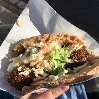 Takeaway falafel and houmous with salad bar at Maoz - Xavier Privas in Paris