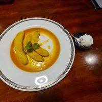 Banana cooked in a rum style sauce with coconut icecream at Hoang's Restaurant Vietnamese Cuisine in Hanoi