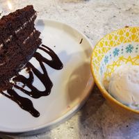 Vegan fudge cake and vanilla ice cream at Delhiwala Food in Leeds