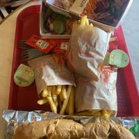 Vegan beyond burger hot dog, 2 vegan salads with legumes and cereals and 2 french fries=37e. It is as bad as you can imagine 😅  at Disneyland - Casey's Corner in Chessy